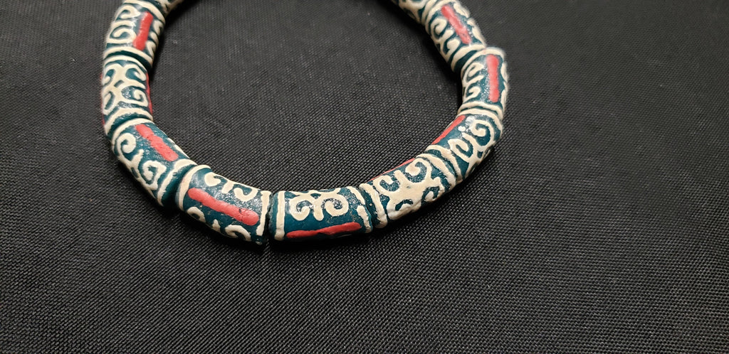 African Recycled Glass Beads Symbolizing Humility and Strength: Crafting with Meaning.