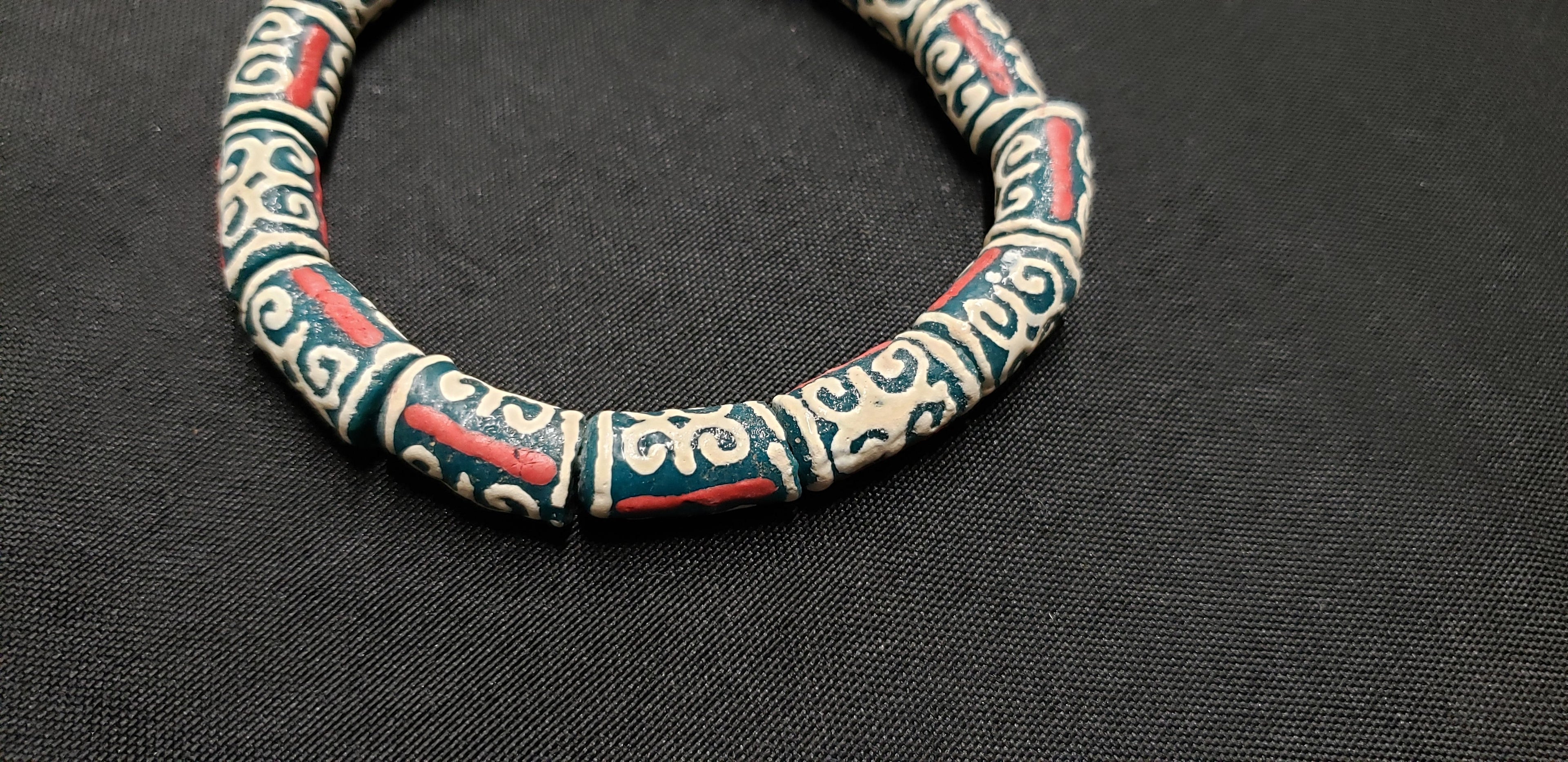 African Recycled Glass Beads Symbolizing Humility and Strength: Crafting with Meaning.