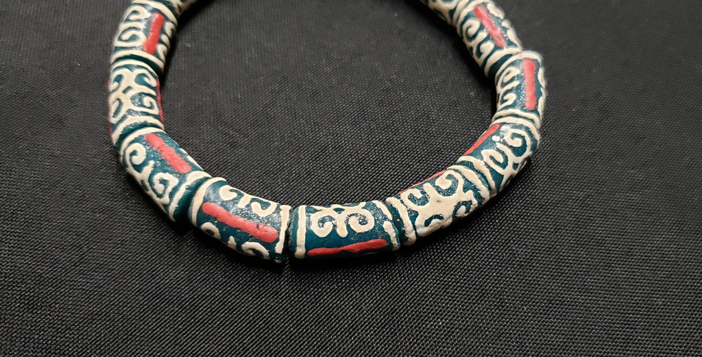 African Recycled Glass Beads Symbolizing Humility and Strength: Crafting with Meaning.