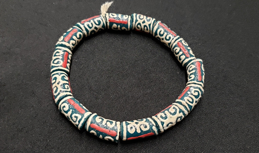 African Recycled Glass Beads Symbolizing Humility and Strength: Crafting with Meaning.