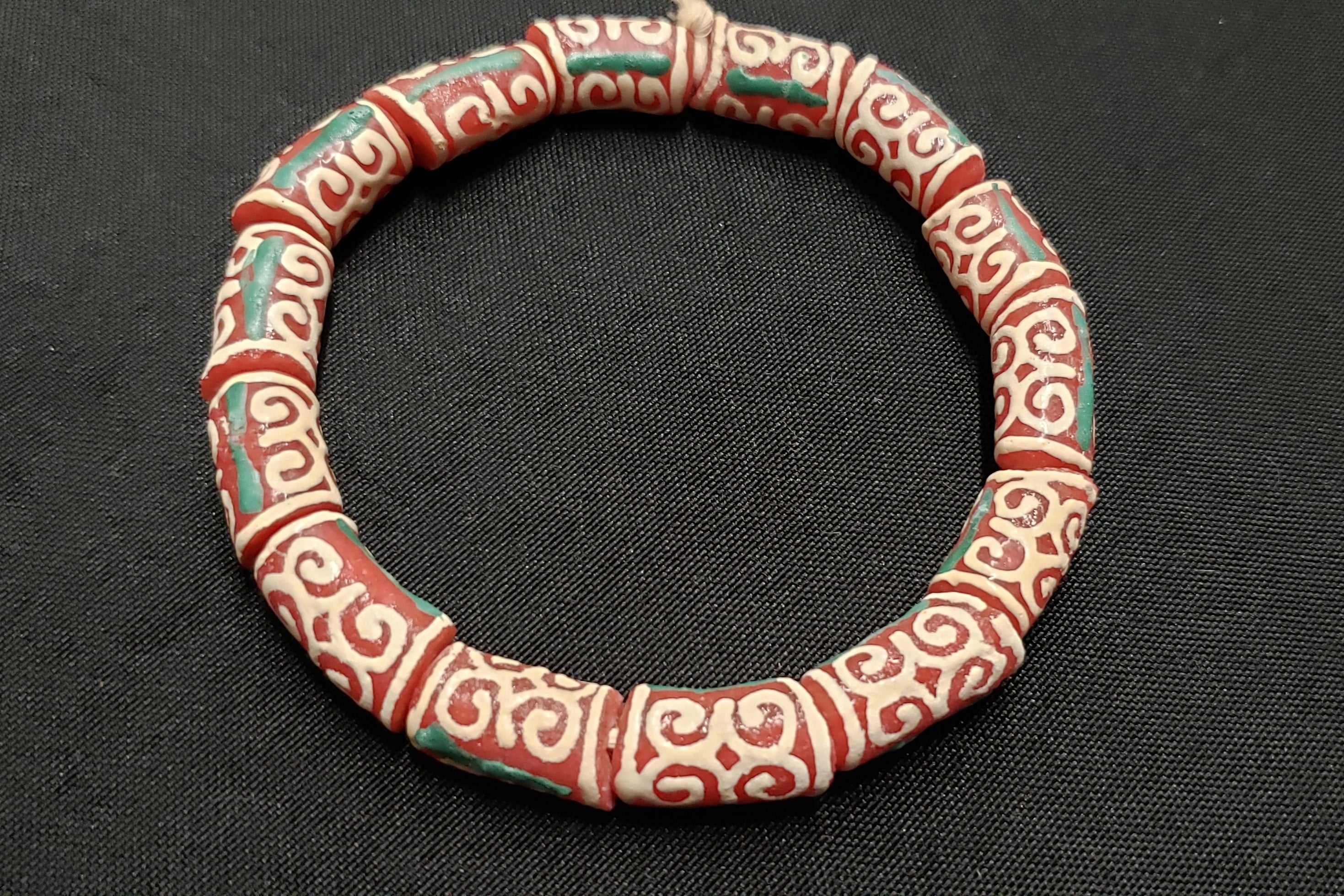 Craft with African glass beads from Ghana. Design jewelry, accessories, or crafts, with Dwennimmen Adinkra beads.