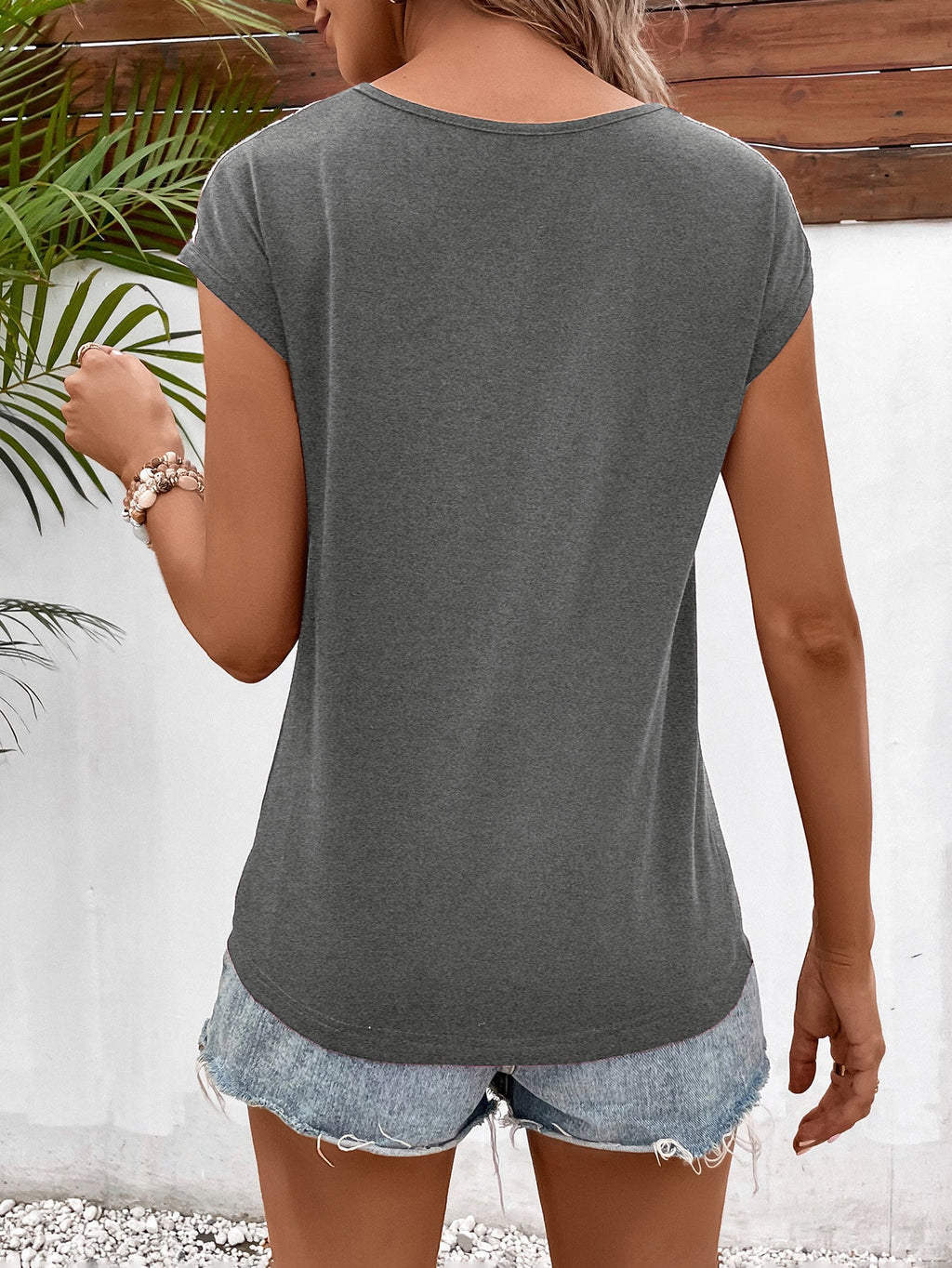 Ivy Lane Spliced Lace V-Neck Twisted Hem Tee