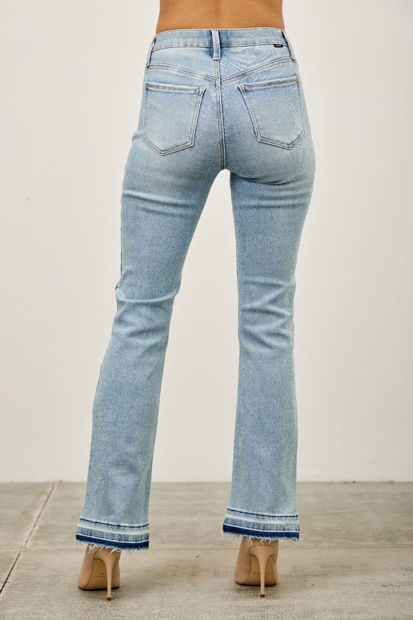 Mid Rise Flare With Released Hem